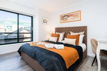 Elegant Flat w/ Balcony | Ace Location by HostWise