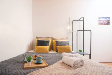 Colourful Trendy House | Garden by HostWise photo 4
