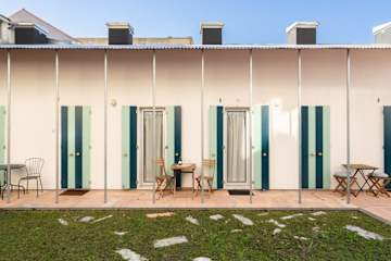 Colourful Trendy House | Garden by HostWise photo 2