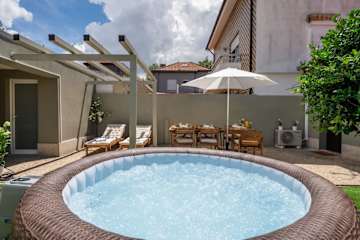 Terrace Delight House w/ Jacuzzi by HostWise photo 4