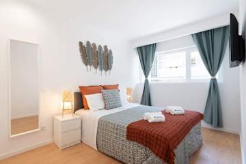 Sunny Cozy Flat w/ Balcony by HostWise