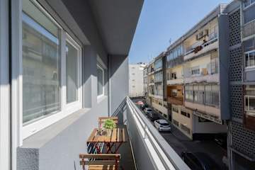 Sunny Cozy Flat w/ Balcony by HostWise photo 3