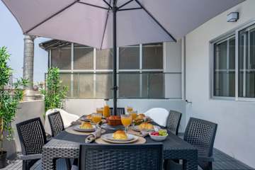 Modern Flat w/ Stunning Terrace by HostWise photo 2