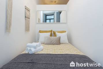 Cozy Bright Rustic Flat | City Center by HostWise photo 3