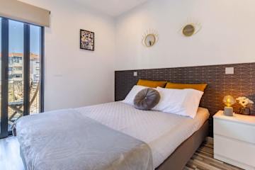 Modern & Stylish Flat w/Balcony by Host Wise photo 3
