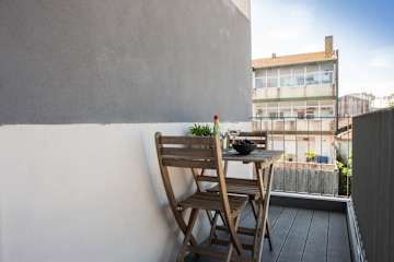 Charming Urban Flat w/ Balcony by HostWise photo 4