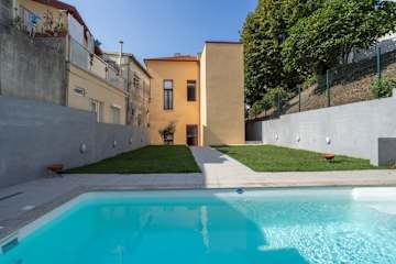 Quiet Bright Duplex | Swimming Pool by HostWise photo 2