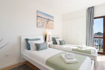 Bright & Spacious Retreat with Balcony by HostWise photo 4