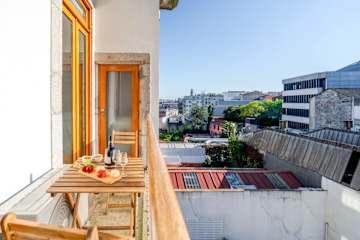 Bright & Airy Flat w/ Balcony by HostWise photo 4