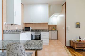 Bright & Airy Flat w/ Balcony by HostWise photo 3