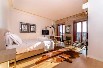 Artistic Studio Escape | Balcony by HostWise