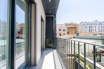 Stylish Flat w/ Balcony by HostWise photo 2