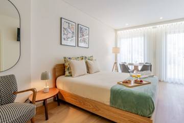 Bright Flats with City Views by HostWise