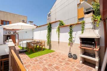 Spacious Duplex | Jacuzzi & Terrace by HostWise