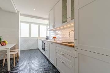 Bright & Spacious Flat w/ Garage by HostWise photo 4