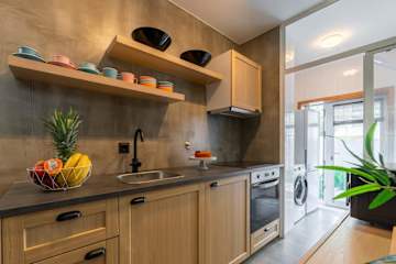 HostWise – Modern Flat w/ Terrace | Near the Beach photo 5