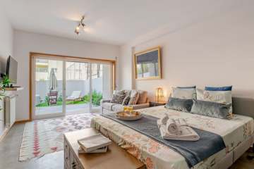 HostWise – Modern Flat w/ Terrace | Near the Beach photo 3