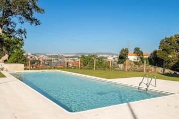 Luxurious Flat w/ Balcony & Pool by HostWise
