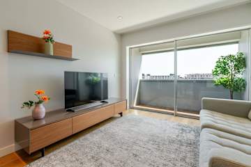 Stylish Home with Balcony & Garage by HostWise