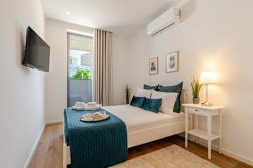 Sleek & Modern Flat w/ Private Garage by HostWise photo 2