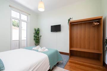 Riverside Miragaia 2BR w/ Balcony by HostWise photo 4