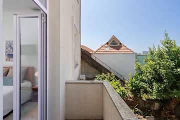 Riverside Miragaia 2BR w/ Balcony by HostWise photo 5
