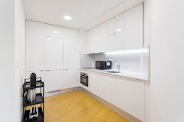 Modern & Central Flat w/ Garage by HostWise photo 3