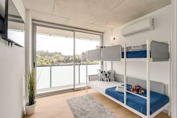 Premium Flat w/ Balcony, Pool & Garage by HostWise photo 4