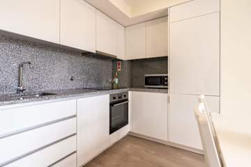 Modern & Sleek Flat | Terrace & Garage by HostWise photo 4