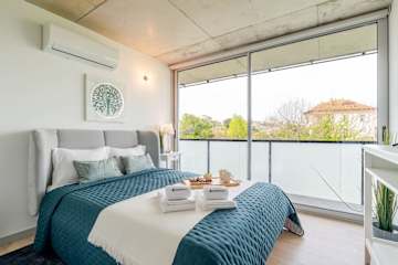 2 Poolside 2BR with Balcony in Gaia by HostWise photo 3