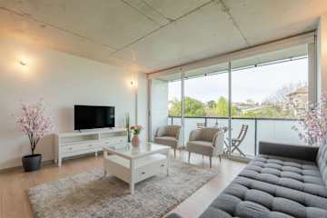Poolside 2BR with Balcony in Gaia by HostWise