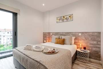 Modern & Stylish Retreat w/ Balcony by HostWise