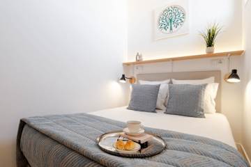 Authentic Studio 3 with Terrace by HostWise