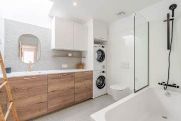 Stylish Open-Plan Flat with Garage by HostWise photo 4