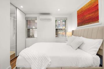 Photo #7 of Madison Gardens | Designer 1BR in Flatiron Brownstone