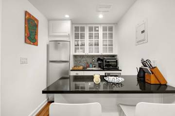 Photo #6 of Madison Gardens | Designer 1BR in Flatiron Brownstone