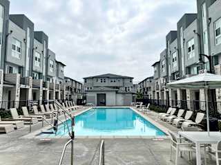 Community pool, a perfect spot for a refreshing dip and sunny vibes.