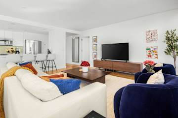 Photo #3 of Sutton Lane | 3rd-floor 2BR w/Doorman, Gym, and Pool