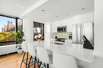 Photo #14 of Sutton Lane | 3rd-floor 2BR w/Doorman, Gym, and Pool