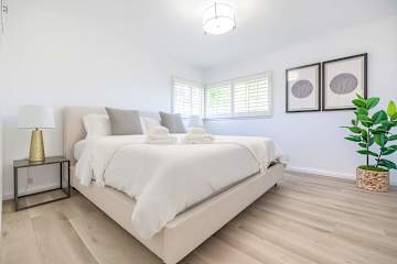 Cozy bedroom with soft lighting and fresh linens