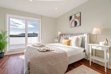 Bright Beachside Flat with Terrace by HostWise photo 4
