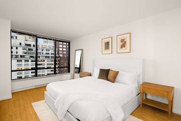 Photo #8 of River Villa | 17th-floor 4BR w/Doorman, Gym, Pool