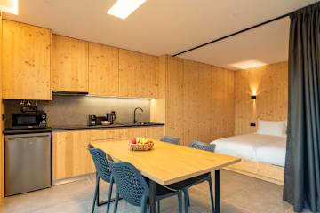 Modern Studio with Sunlit Deck by HostWise photo 5