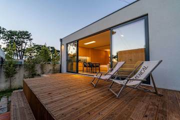 Modern Studio with Sunlit Deck by HostWise photo 3