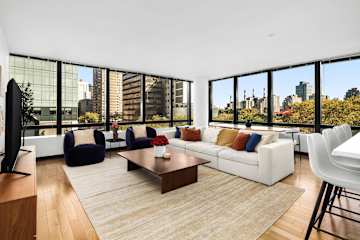 Photo #2 of Sutton Landing | 17th-floor 2BR w/Doorman, Gym, and Pool