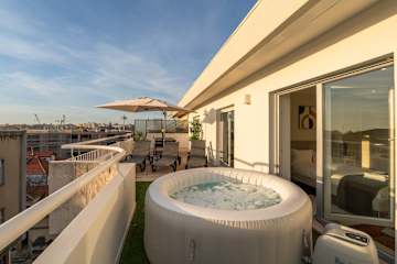 Bright Beachside Flat with Terrace by HostWise photo 3