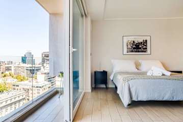 Sleek Urban Flat | Steps from Costanera Center