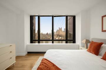 Photo #10 of Sutton Landing | 17th-floor 2BR w/Doorman, Gym, and Pool