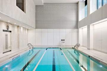 Photo #21 of Sutton Penthouse | 35th-floor 2BR w/Doorman, Gym, and Pool