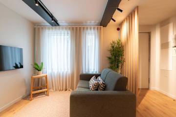 Minimalist Duplex House by HostWise photo 2